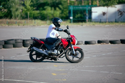 Moto school track driving. A biker on a motorcycle. 