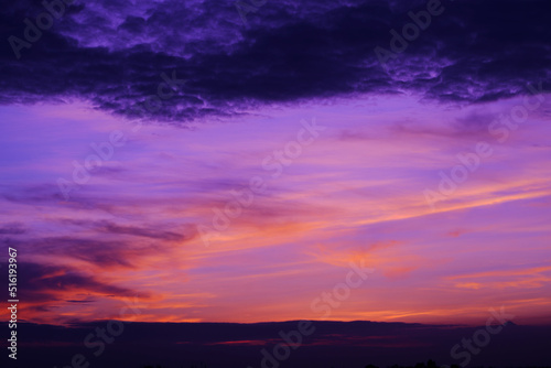 Dusk sky sun setting nature panorama background. © Ammak