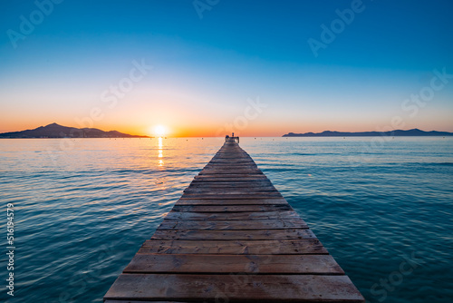 Fototapeta Naklejka Na Ścianę i Meble -  wooden pier at sunset
