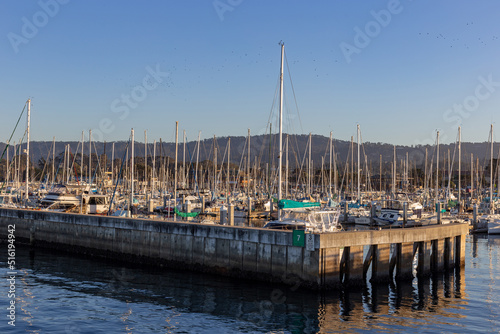 Gentle sunset on the ocean with boats