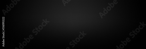 Metal mesh on a black background illuminated by white light Advertising space