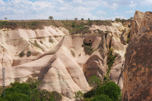 Cappadocia nature and hills with a cave house, Nevsehir, Turkey.