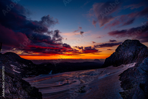 Summer sunrise in the Alps on the top of the Dachstein 3000 m. photo