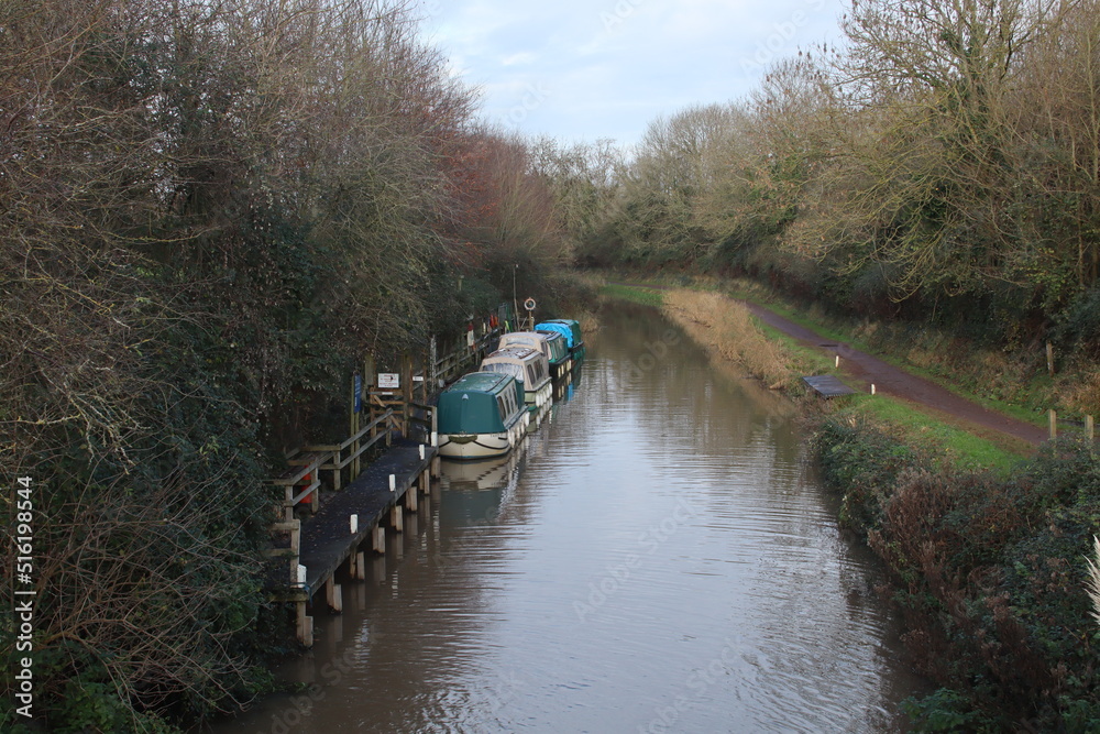 Barges moored on the Bridgewater and Taunton Canal in Somerset. It opened in 1827 and linked the River Tone to the River Parrett Barges moored on the Bridgewater and Taunton Canal in Somerset. It opened in 1827 and linked the River Tone to the River Parrett