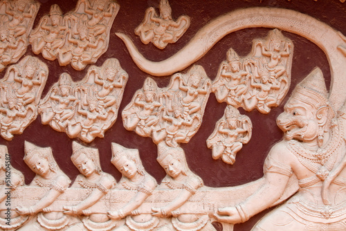 Wat Ounalom : sculpture depicting a scene from the Ramayana, the churning of the sea of milk photo