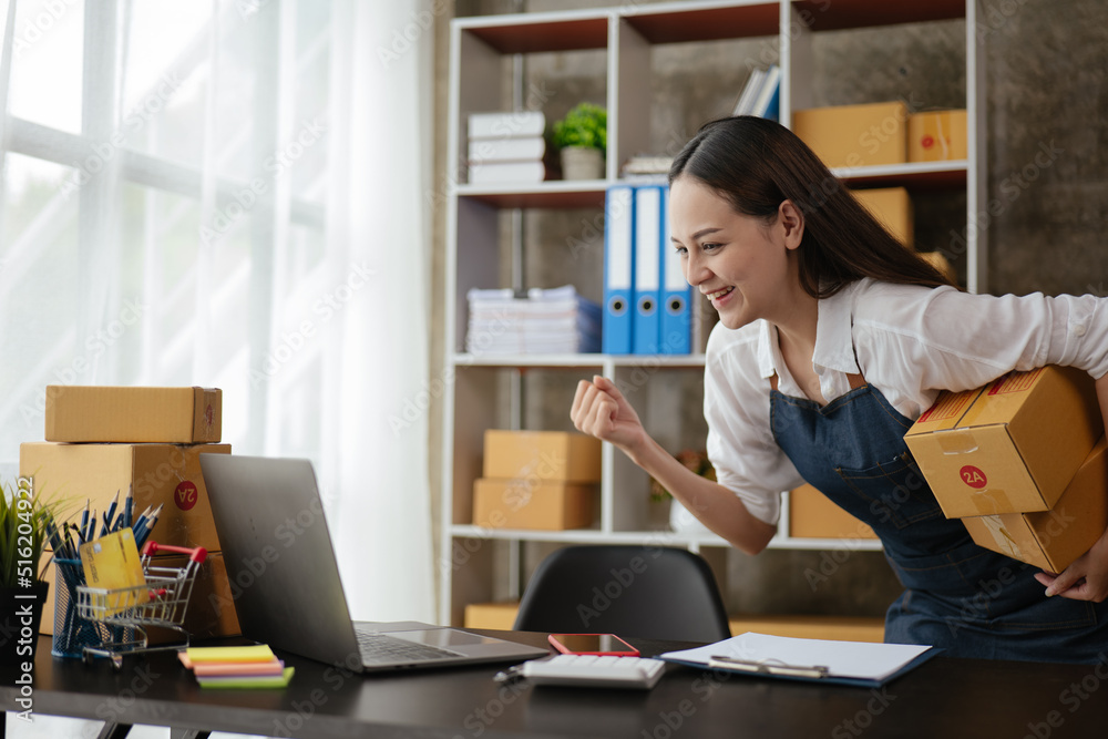 Business woman happy and cheerful for successful on project via laptop in office space. Business woman happy and cheerful for successful on project via laptop in office space.