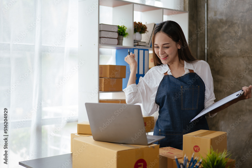 Business woman happy and cheerful for successful on project via laptop in office space. Business woman happy and cheerful for successful on project via laptop in office space.