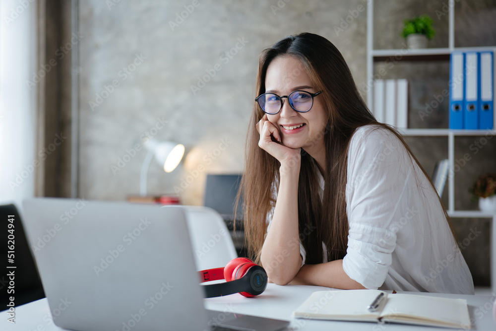 Beautiful woman is study and working on paperworks and laptop at home. Beautiful woman is study and working on paperworks and laptop at home.