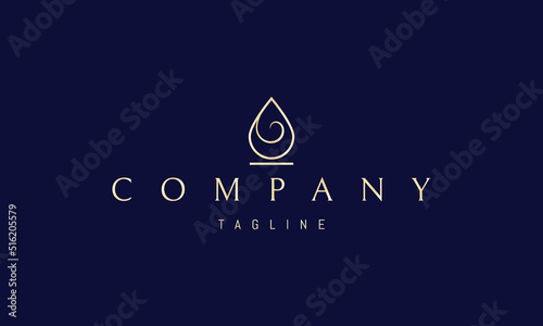 Vector golden logo on which an abstract image of a water drop with a wave inside.
