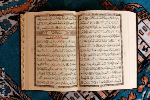 Open Kuran and prayer mat