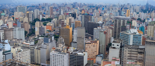 Aerial view of several tall business and residential buildings in Sao paulo city center.