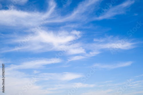 Blue sky with thin cirrus clouds, daytime landscape