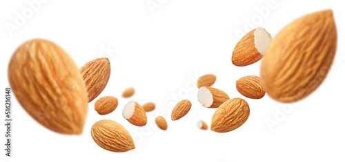 Flying almonds, isolated on white background