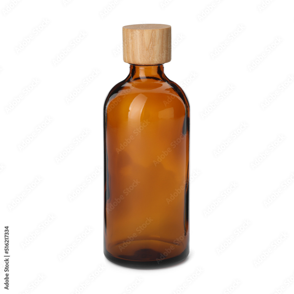 New empty glass bottle with wooden cap isolated on white New empty glass bottle with wooden cap isolated on white