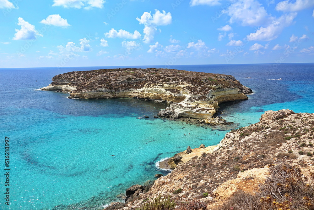 Fototapeta premium View of the most famous sea place of Lampedusa, Rabbits Beach or Conigli island. LAMPEDUSA, ITALY - AUGUST, 2019