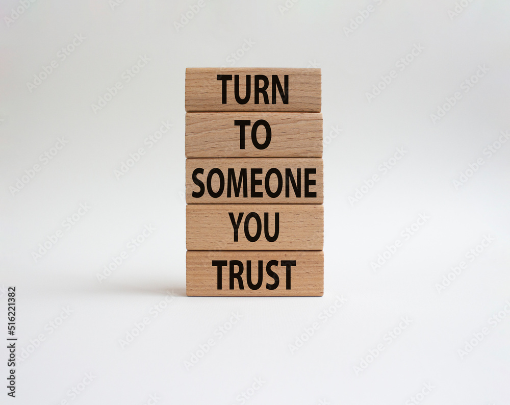 Turn to Someone you trust symbol. Wooden blocks with words Turn to Someone you trust. Beautiful white background. Business and Turn to Someone you trust. Copy space. Turn to Someone you trust symbol. Wooden blocks with words Turn to Someone you trust. Beautiful white background. Business and Turn to Someone you trust. Copy space.