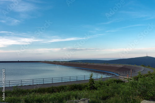 Wallpaper Mural Upper water reservoir of the pumped storage hydro power plant Dlouhe Strane in Jeseniky Mountains, Czech Republic. Summer sunset  with blue sky and clouds. Torontodigital.ca