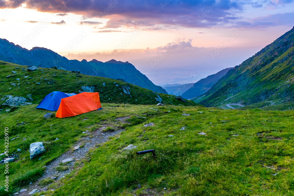 Tourist tents near the pass of Transfagarasan road, is one of most beautiful roads in world. Carpathians. Romania
