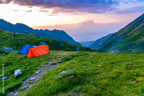 Tourist tents near the pass of Transfagarasan road  is one of most beautiful roads in world. Carpathians. Romania