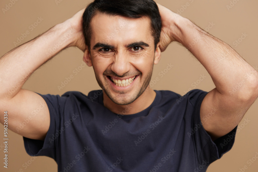 handsome man hand gesture gray t-shirt fun lifestyle cropped view handsome man hand gesture gray t-shirt fun lifestyle cropped view