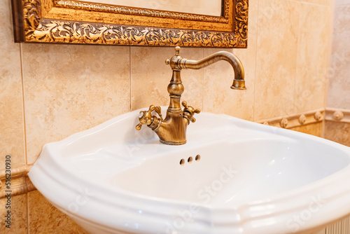 water tap and washstand in retro style. vintage interior.