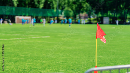 Corner flag on soccer field. Football soccer field with green grass