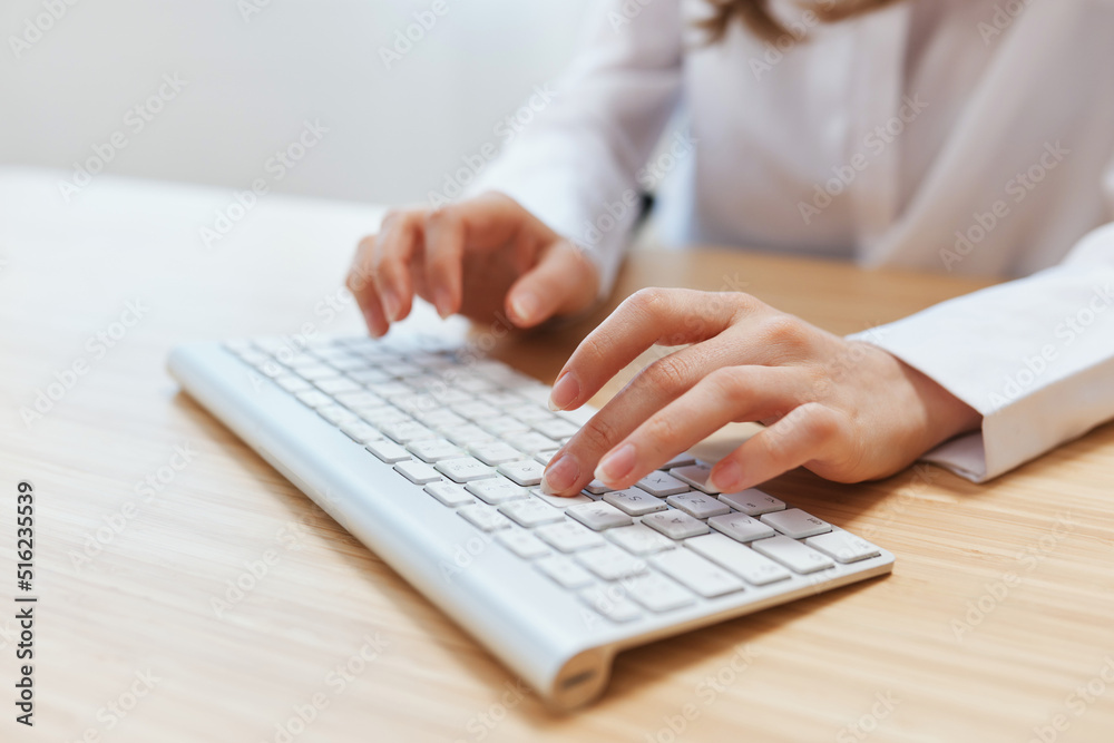 Closeup shot hands of businesswoman journalist office worker freelancer typing report doing documents on keyboard. Online communication, Remote job or Education. Copy space, wide angle Closeup shot hands of businesswoman journalist office worker freelancer typing report doing documents on keyboard. Online communication, Remote job or Education. Copy space, wide angle