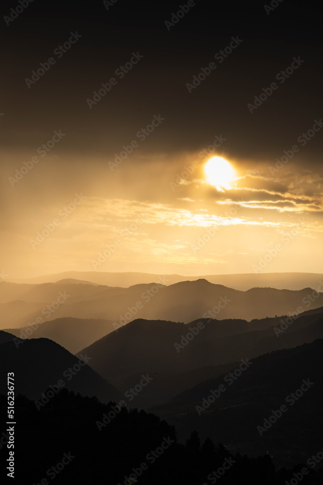 banner of mountain peaks in beautiful stormy sunset light banner of mountain peaks in beautiful stormy sunset light
