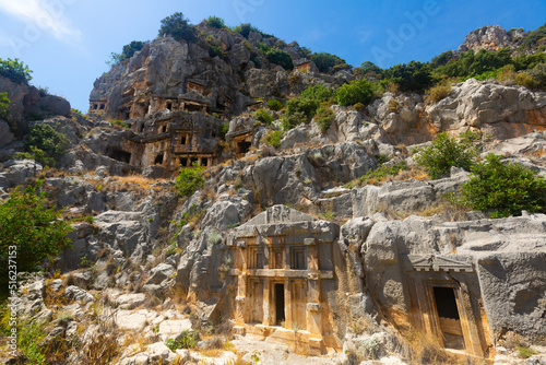 View of the ancient Lycian rock tombs on the mountainside, located in the city of Myra in modern Demre, Turkey