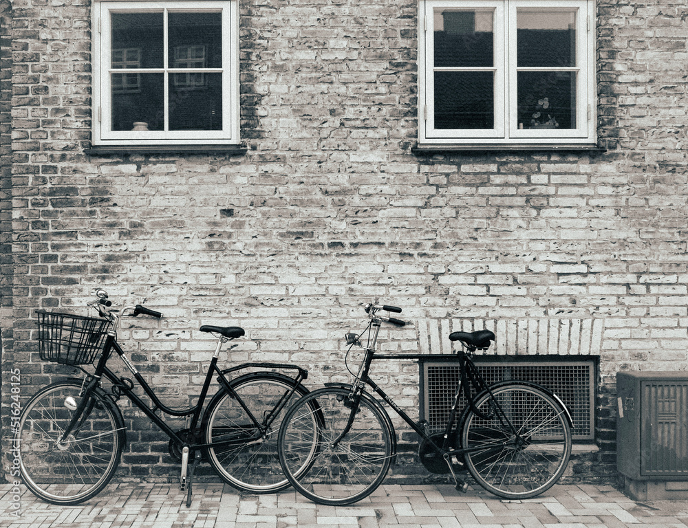 Bicycles in front of a brick wall in Denmark