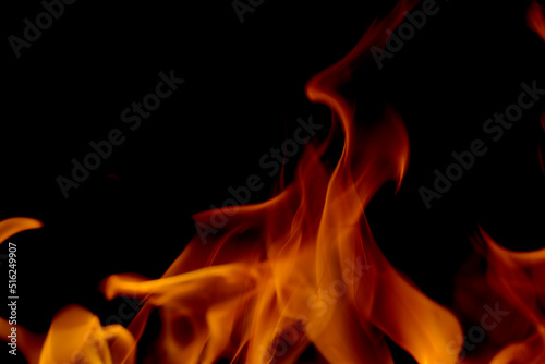 Abstract blur of Fire flames on black background. Burning power.