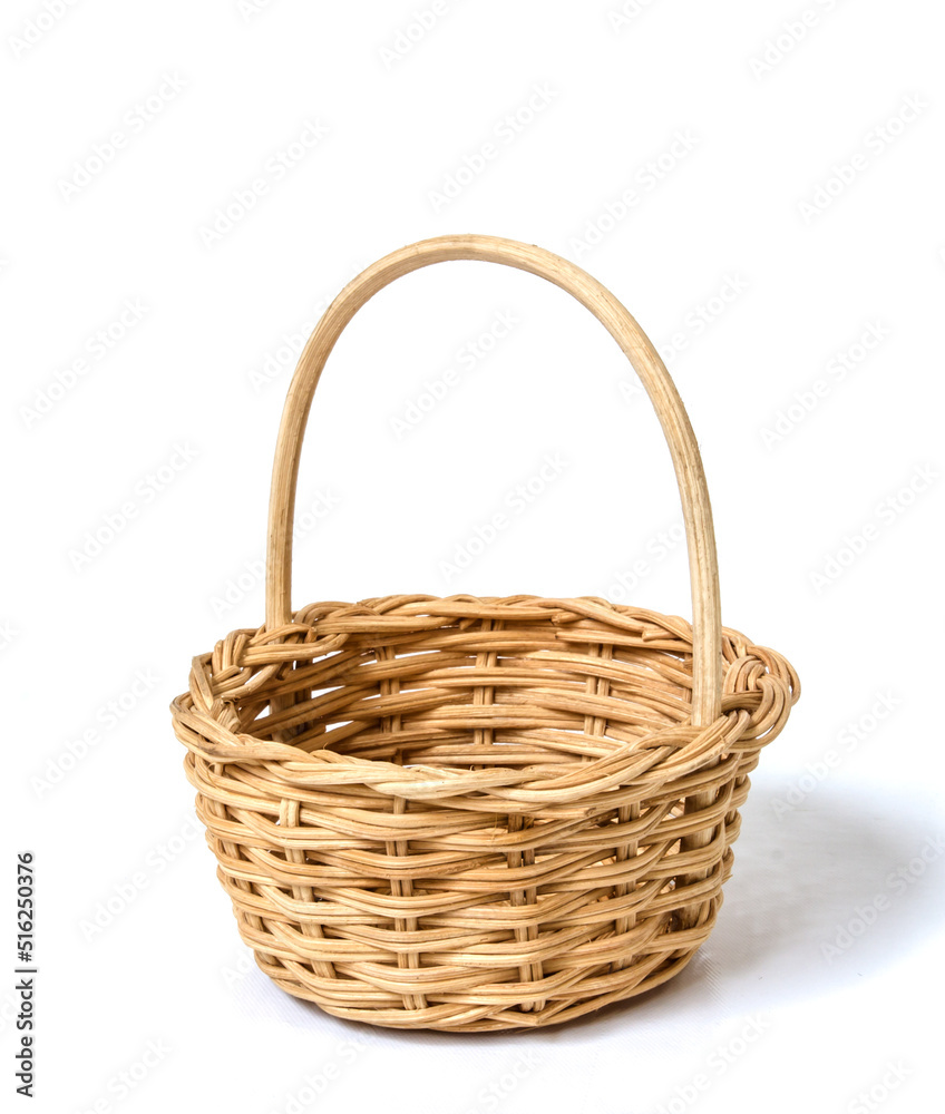 Handmade Rattan basket shot on white isolated.