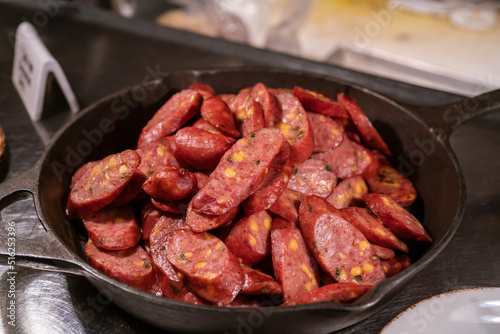 sausages in frying pan