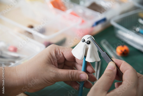 Boy is playing polymer clay
