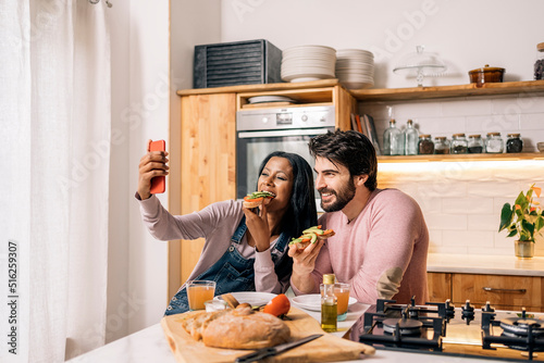 Multi-Ethnic Couple Taking Selfie