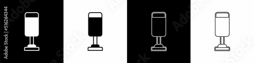 Set Punching bag icon isolated on black and white background. Vector
