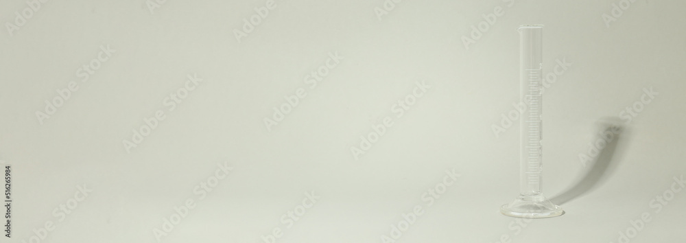 Concept of laboratory accessories, tube on light background Concept of laboratory accessories, tube on light background