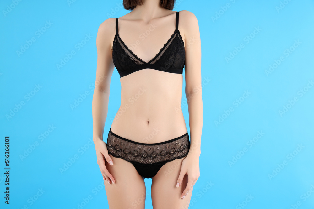 Concept of beauty with slim young woman on blue background Concept of beauty with slim young woman on blue background
