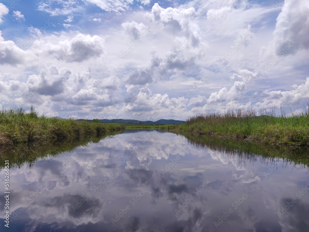 Fototapeta premium clouds over the lake