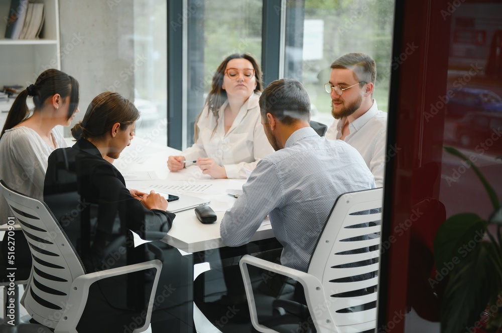 Group of young people in business meeting