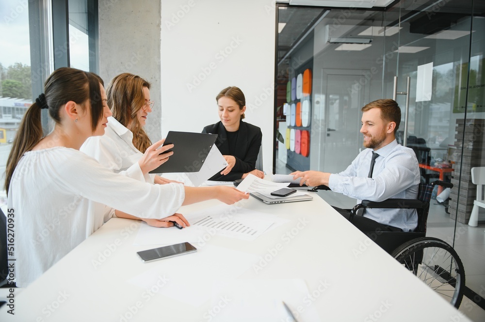 Corporate business team and manager in a meeting room at modern office with panoramic windows. Business concept Corporate business team and manager in a meeting room at modern office with panoramic windows. Business concept