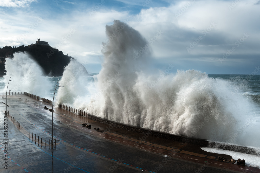 Fototapeta premium Waves breaking on New Promenade of Donostia-San Sebastian, Spain