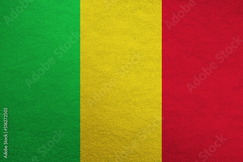 Modern shine leather background in colors of national flag. Mali