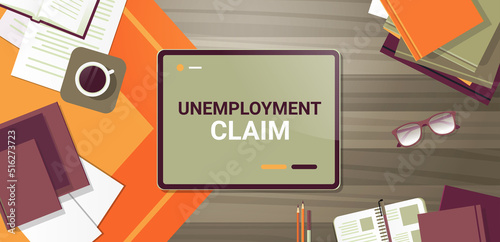 unemployment claim on tablet pc screen work crisis jobless employee job reduction concept