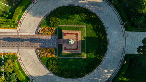 Aerial top view monument of the writer Taras Grigorovich Shevchenko in park on a sunny summer day. Capital of Ukraine photo