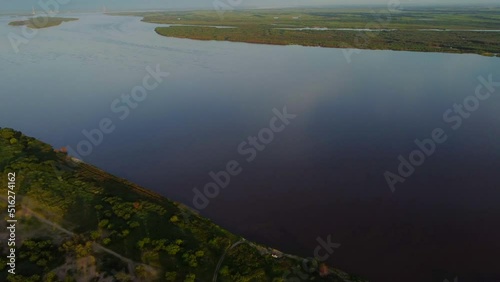 Panoramic shooting from the height of the Amur River at sunrise. Filmed on Bolshoy Ussuriysky Island in the Khabarovsk Territory in Russia. photo