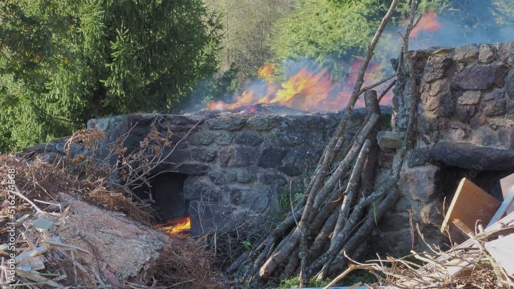 Old open air pottery kiln during demonstration of ancestral traditions. Static Old open air pottery kiln during demonstration of ancestral traditions. Static