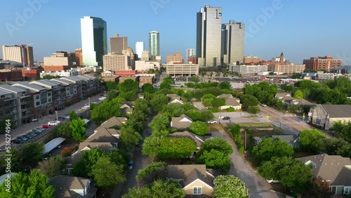 Residential neighborhood in Fort Worth Texas. Urban city skyline in distance. Golden hour shot. photo
