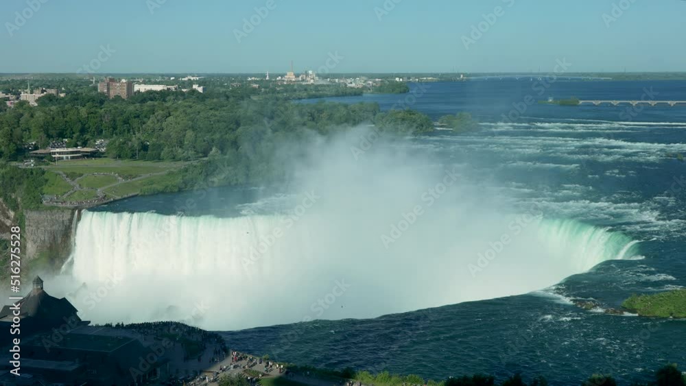 A medium shot of mist rising over Niagara Falls. A medium shot of mist rising over Niagara Falls.
