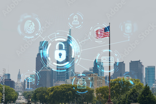 Day time cityscape of Philadelphia financial downtown, Pennsylvania, USA. City Hall neighborhood. Glowing Padlock hologram. The concept of cyber security to protect companies confidential information